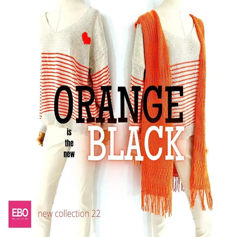 Conjunto naranja y blanco