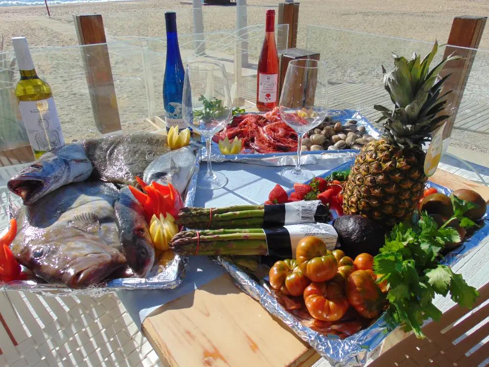 Productos frescos: pescado, mariscos, verdura, fruta y vino