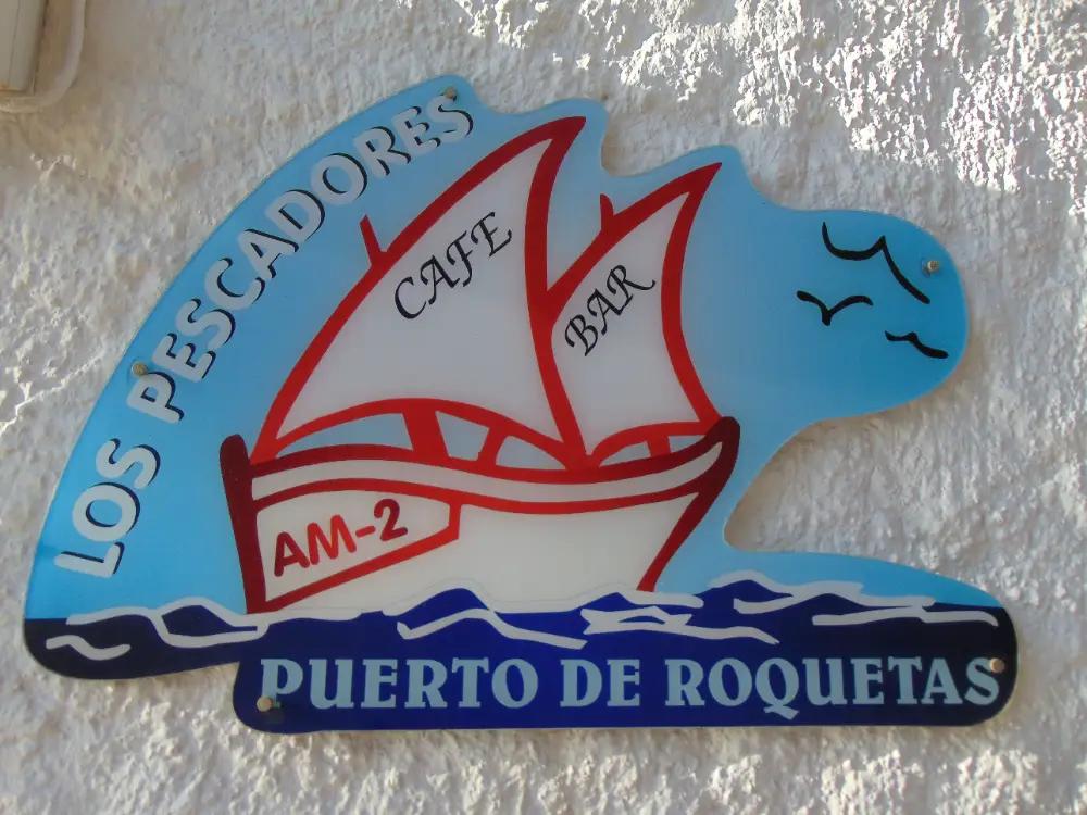 Logo en la pared de Café bar Los Pescadores